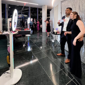Dual Photo Booth Setups in Operation Dual Photo Booth Setups in Operation at a Corporate Party